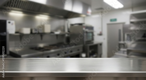 Empty Metal Countertop with Blurred Commercial Kitchen Background for Food Presentation