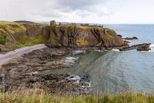 Dunnottar Castle rises in dramatic ruins atop a cliff overlooking the North Sea. Its breathtaking views, rich history, and rugged beauty make it one of Scotland’s most iconic and cinematic locations