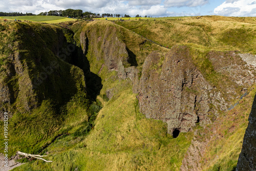 Dunnottar Castle rises in dramatic ruins atop a cliff overlooking the North Sea. Its breathtaking views, rich history, and rugged beauty make it one of Scotland’s most iconic and cinematic locations