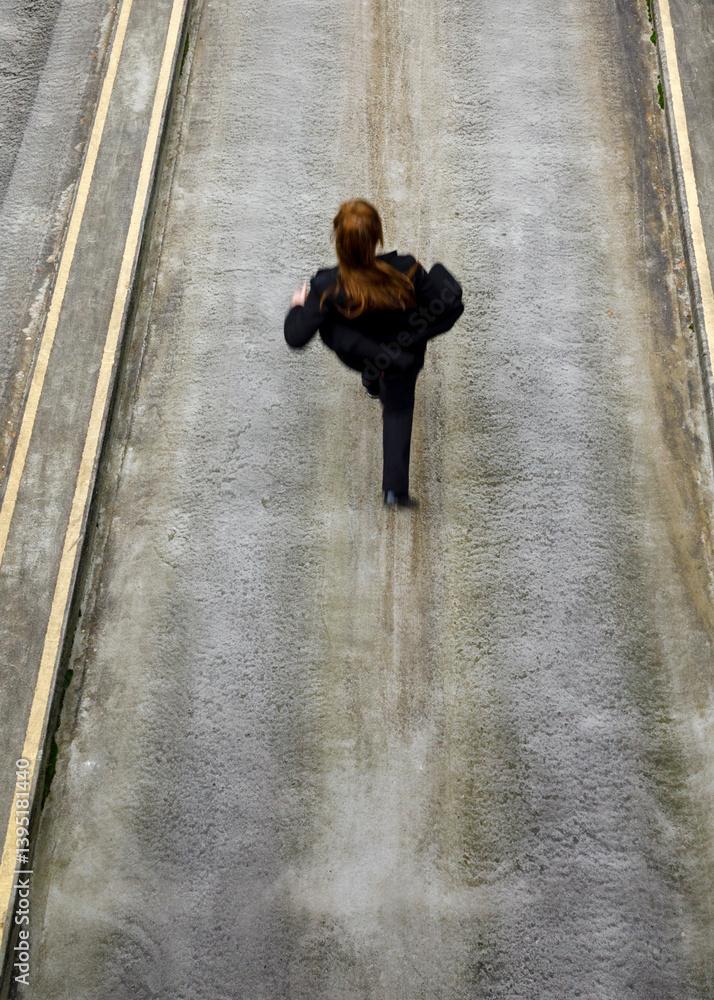 young woman running on the street young woman running on the street