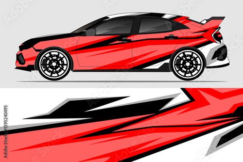 Sporty red car with dynamic graphic design parked against a neutral background, showcasing modern styling