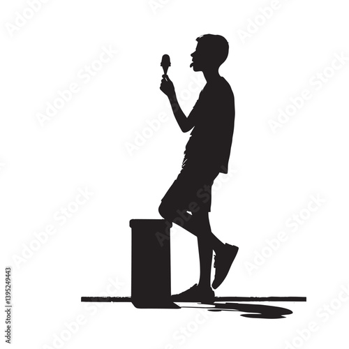 Silhouette of a Boy Eating Ice Cream Standing by a Bench