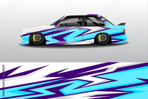 Stylishly Modified Car with Vibrant Blue and Purple Graphics in a Minimalistic Setting