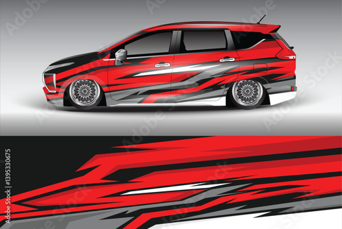 Stylish red and black modified car with striking graphics parked against a gradient background
