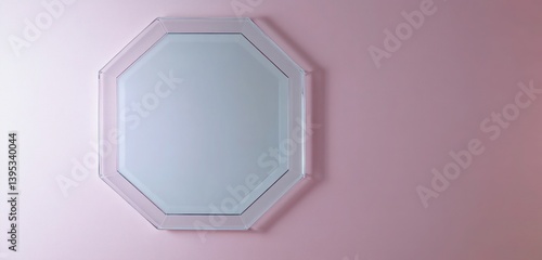 Obraz na płótnie A frameless octagonal glass, with frosted edges, hanging asymmetrically on a blush pink wall, adding a soft and airy appeal. w salonie