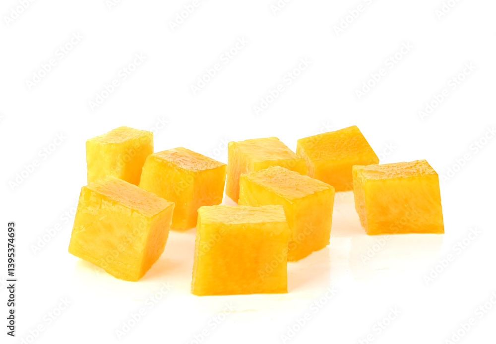 Mango cubes. Isolated on a white background. Mango cubes. Isolated on a white background.