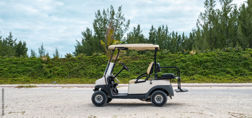 Golf Cart Parked on the Street, Transportation on Bimini Island, Bahamas.