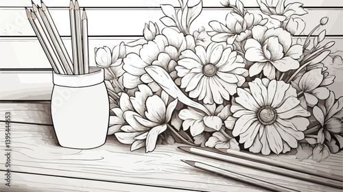 Close-up of coloring picture and pencils on table for creative art projects