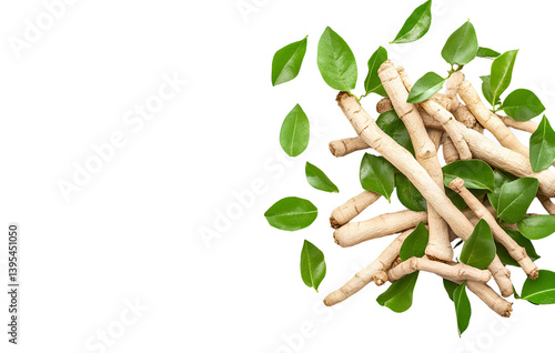 A pile of ashwagandha roots and green leaves on a transparent background