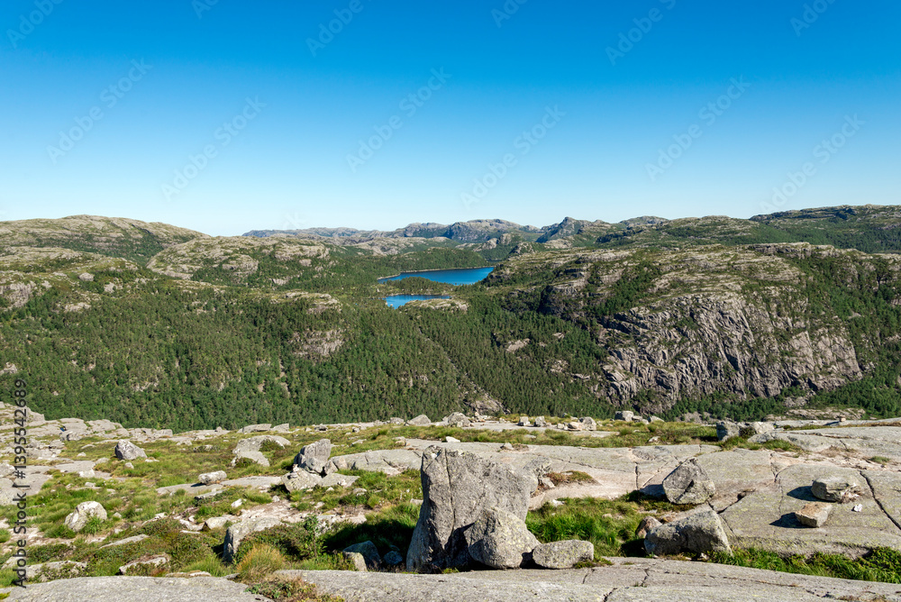 Scenic Mountain Landscape with Rocky Terrain and Green Forests From Preikestolen Hiking Trail, Stavanger, Norway, July 2018