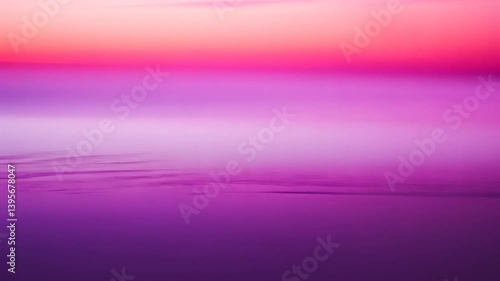 Abstract dreamy sunset reflecting vibrant purple and pink hues on a calm horizon