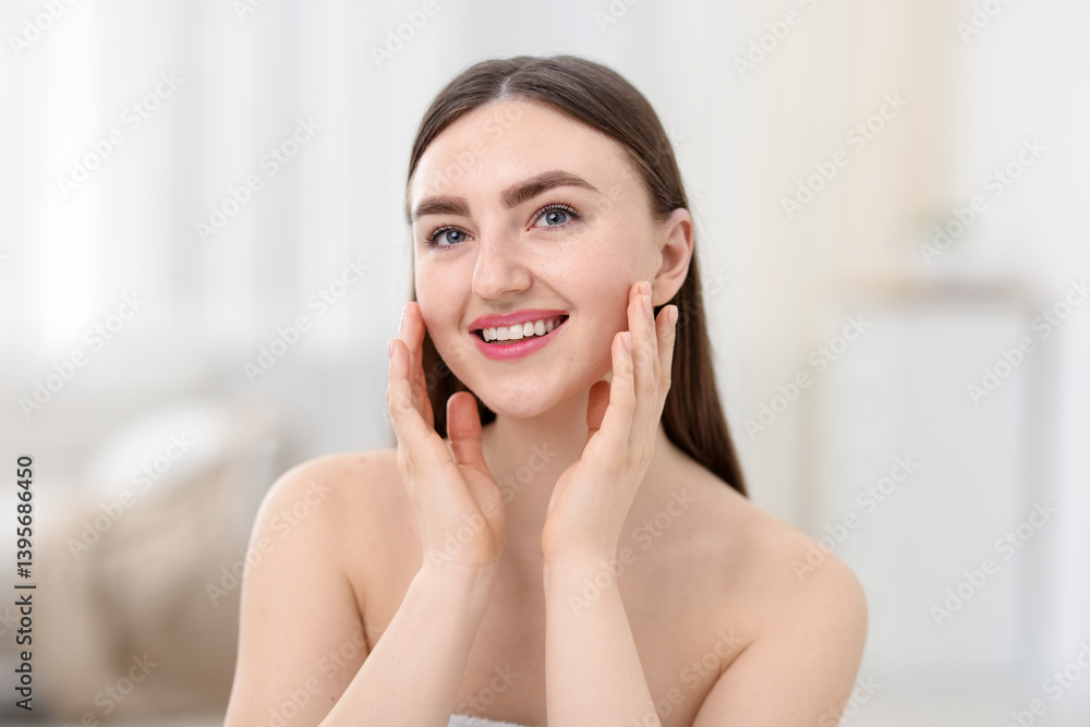 Smiling woman with healthy skin on blurred background Smiling woman with healthy skin on blurred background