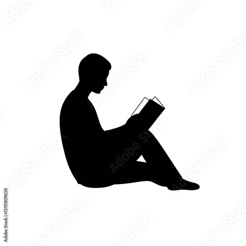 Silhouette of a Person Sitting and Reading a Book