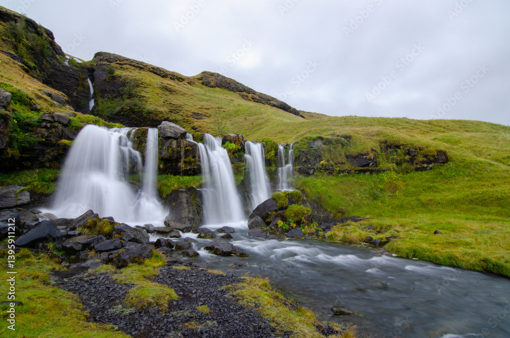 A breathtaking waterfall in Iceland flows with pure, untamed beauty—its steady rush and misty spray capturing the peaceful power of nature in this remote, magical land. A breathtaking waterfall in Iceland flows with pure, untamed beauty—its steady rush and misty spray capturing the peaceful power of nature in this remote, magical land.