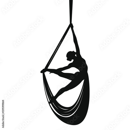 Graceful Silhouette of Aerialist on Silk/A stunning silhouette of a female aerialist performing a graceful pose suspended from aerial silks.