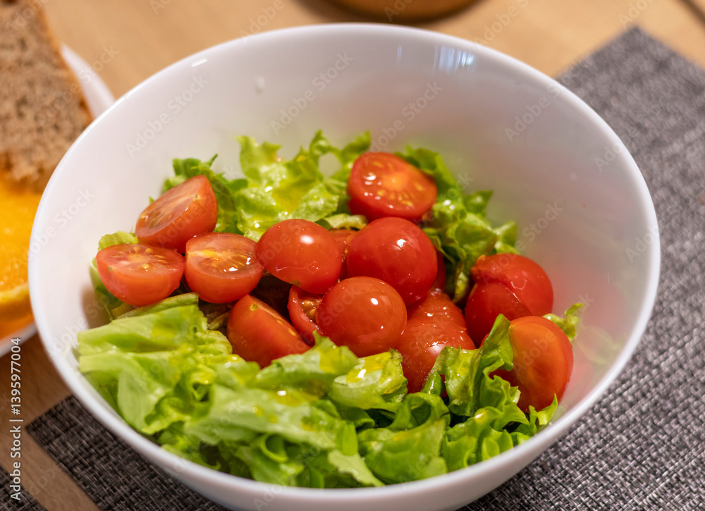 Bawl with cherry tomatoes and lettuce leaves, Food Bawl with cherry tomatoes and lettuce leaves, Food
