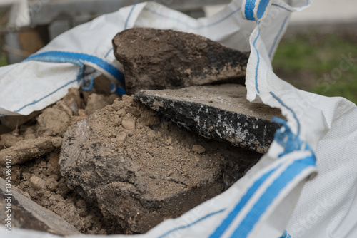 Wallpaper Mural The pieces of the paved road are stacked in a dedicated bag Torontodigital.ca