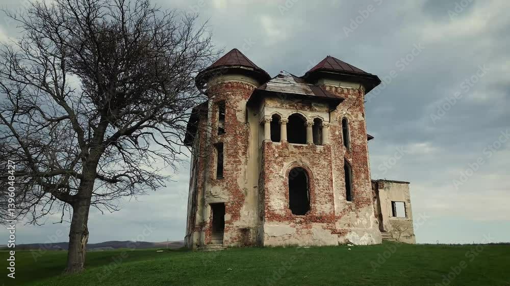 Old abandoned mansion, on top of a hill. Ruined mansion-castle. Beautiful 19th century architecture. Old abandoned mansion, on top of a hill. Ruined mansion-castle. Beautiful 19th century architecture.