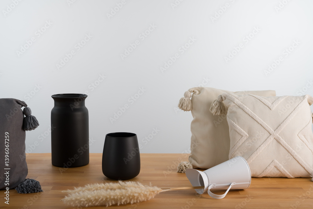 Minimalist Interior Decor: Black Vases and Textured Cushions Still Life