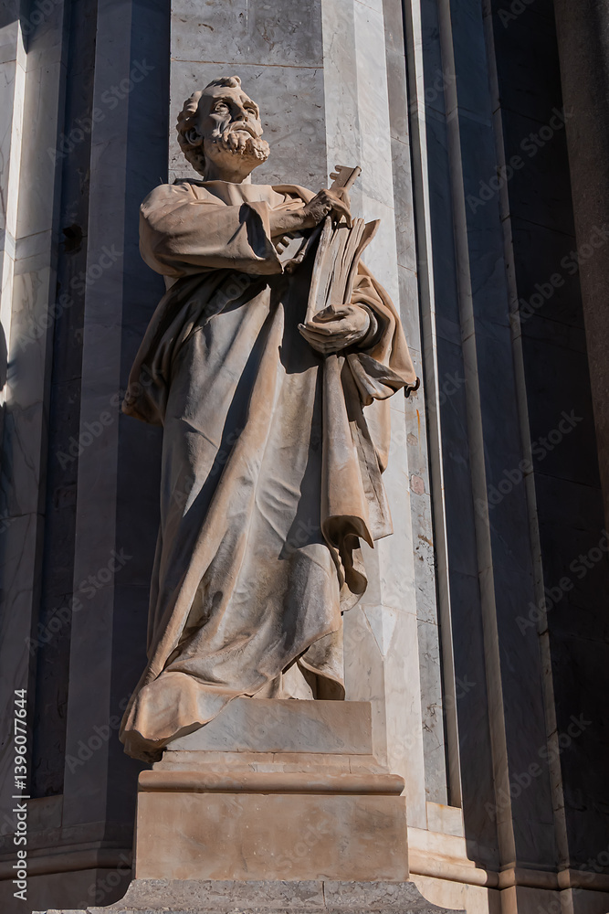 Architectural fragments of Roman Catholic Metropolitan Cathedral of Saint Agatha (Cattedrale di Sant'Agata, 1093, 1761) in the Duomo square. Main façade. Catania, Sicily, Italy.
