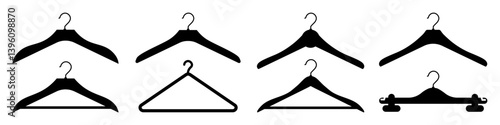 Set of black clothes hangers of different shapes. Neat arrangement in the closet. Vector isolated illustration.