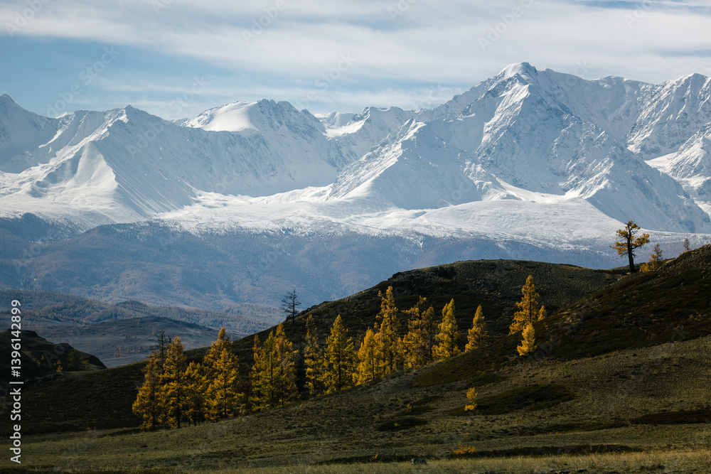 Snow-covered mountain ridges in the Altai Republic, showcasing breathtaking natural beauty and rugged wilderness.