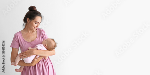 Happy mother with cute litt...