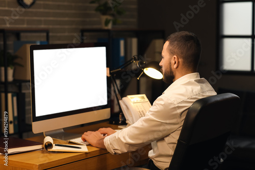 Young businessman working w...