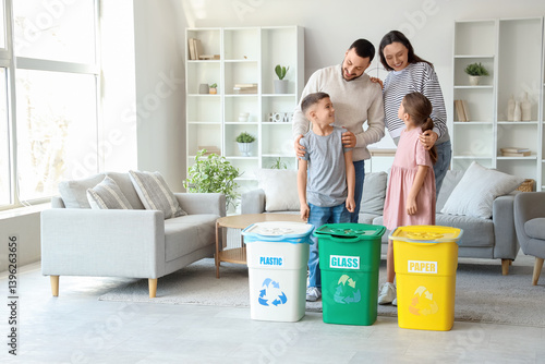 Family with garbage contain...