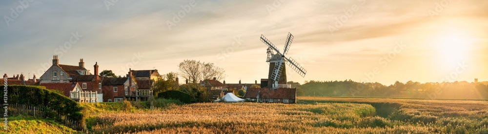 Cley Windmill at sunset in the village of Cley, Norfolk, UK