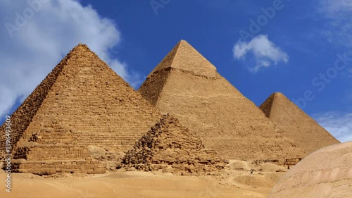 Pyramids And Sphinx from Giza Valley Parallax Animation
Egypt, Pyramid, Giza Pyramids, Cairo, Giza. View of the Pyramids of Giza with sphinx in the foreground 4K stock video. Great Pyramids of Egypt