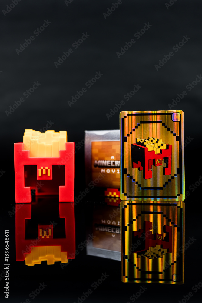 Fototapeta premium Bangkok, Thailand - April 10, 2025 : Fry Helmet Minecraft from McDonald, Toy form Minecraft blind box from McDonald's collaborates Minecraft the movice