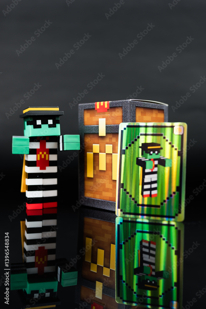 Naklejka premium Bangkok, Thailand - April 10, 2025 : Toy of Zombie hamburglar form McDonald. Blind box toy from McDonald's collaboration with Minecraft movie.
