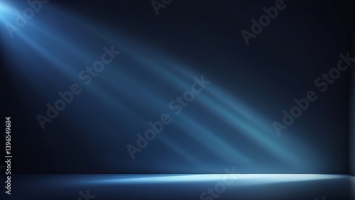 Blue spotlight beam in dark empty room with misty light rays