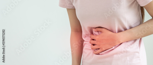 Wallpaper Mural stomach ache. Asian women have abdominal pain, indigestion, gastritis, menstrual cramps, flatulence, diarrhea, distention, colon cancer, belly inflammation problem, suffer food poisoning, abdomen Torontodigital.ca