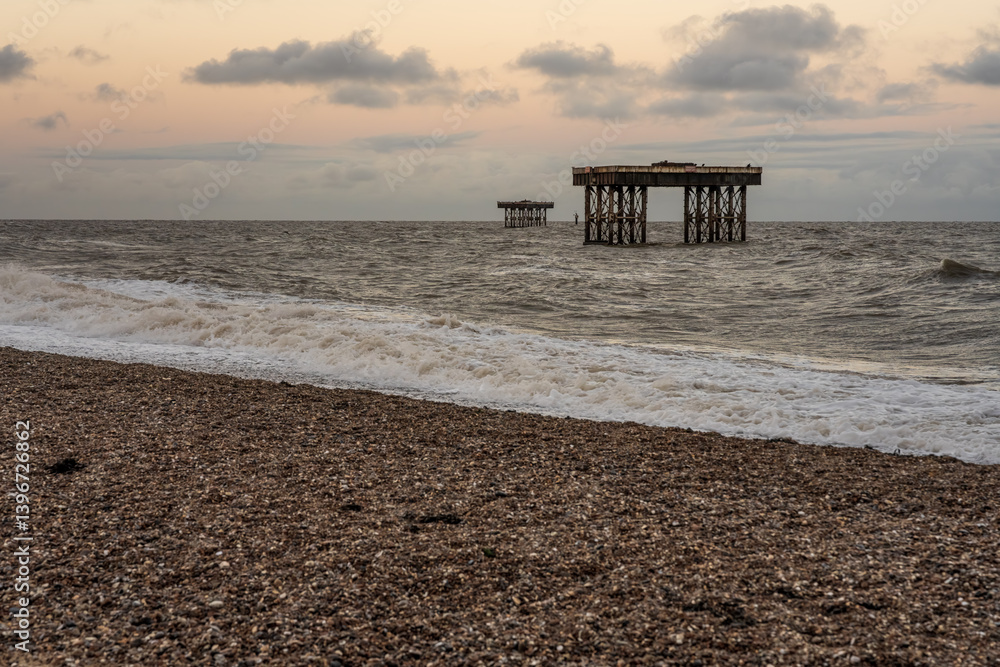 The beach and offshore platforms in Sizewell, Suffolk, England, UK The beach and offshore platforms in Sizewell, Suffolk, England, UK