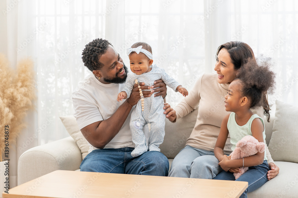 parents spend holiday time together with kids in living room,family having fun in a cozy home,concept of family lifestyle,relationship,domestic life parents spend holiday time together with kids in living room,family having fun in a cozy home,concept of family lifestyle,relationship,domestic life