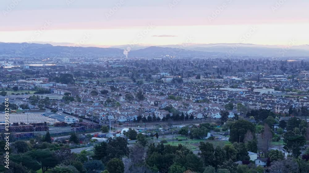 A slow aerial drone view of the neighborhoods in west Alameda, California. Shot on a DJI Air 3S. A slow aerial drone view of the neighborhoods in west Alameda, California. Shot on a DJI Air 3S.