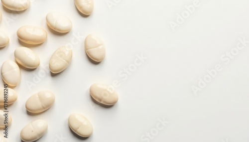 Scattered white beans on pristine white background, purity, farm, bright