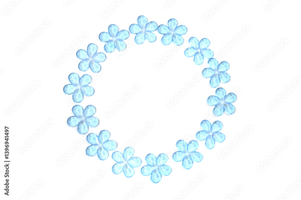 Blue plastic flowers in circle frame isolated on white Blue plastic flowers in circle frame isolated on white