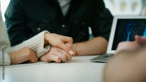 Canvas Print Doctor consulting young couple patients in fertility clinic about IVF or IUI