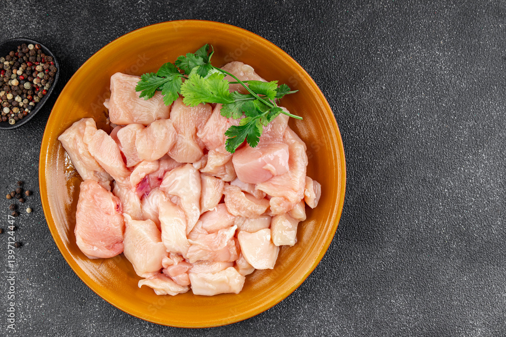 Chicken raw meat pieces of meat poultry tasty fresh delicious gourmet food background on table rustic food top view copy space keto and paleo diet Chicken raw meat pieces of meat poultry tasty fresh delicious gourmet food background on table rustic food top view copy space keto and paleo diet