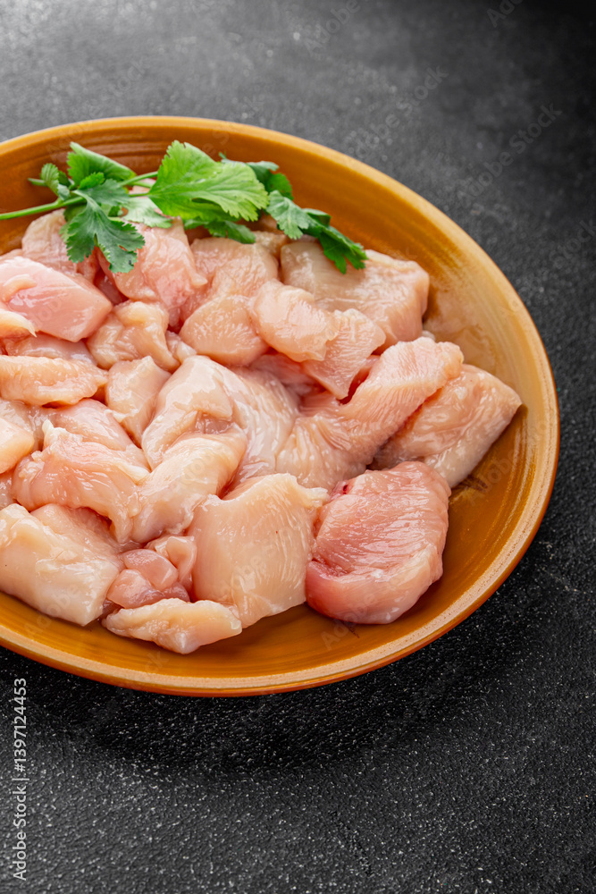 Chicken raw meat pieces of meat poultry tasty fresh delicious gourmet food background on table rustic food top view copy space keto and paleo diet Chicken raw meat pieces of meat poultry tasty fresh delicious gourmet food background on table rustic food top view copy space keto and paleo diet
