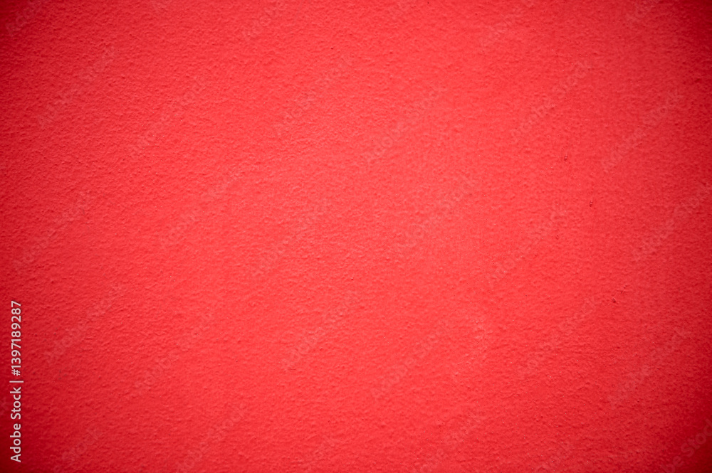 Fototapeta premium rough cement wall painted red