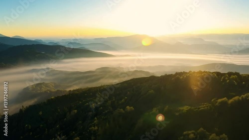 Sunrise Over Foggy Mountain Range