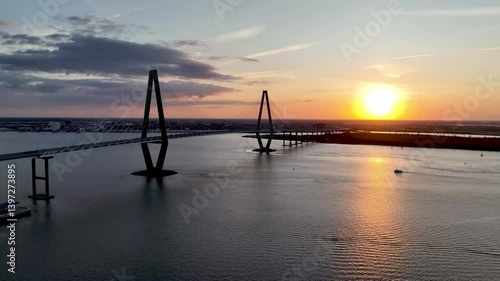 aerial at sunset of the arthur ravenel jr bridge