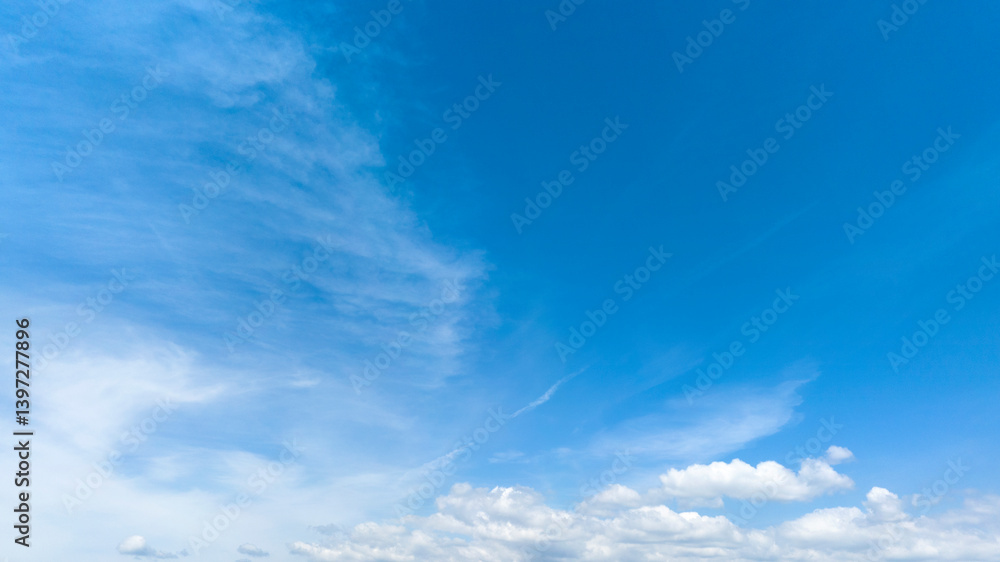 Blue sky with clouds, ideal for backgrounds. Blue sky with clouds, ideal for backgrounds.
