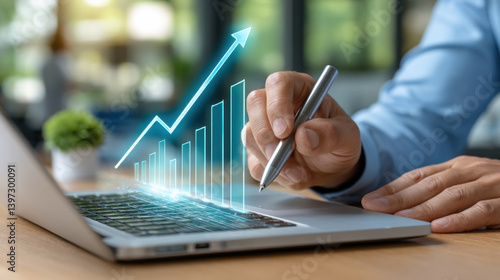 A Hand uses stylus to point at glowing graph on laptop, Business professionals analyze profit statistics and growth data on laptops, driving informed decision-making and financial planning