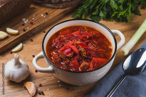 Borscht in a plate on the table