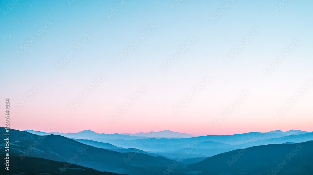 Dusk sky showcases a beautiful transition over the quiet countryside landscape and distant mountains Dusk sky showcases a beautiful transition over the quiet countryside landscape and distant mountains